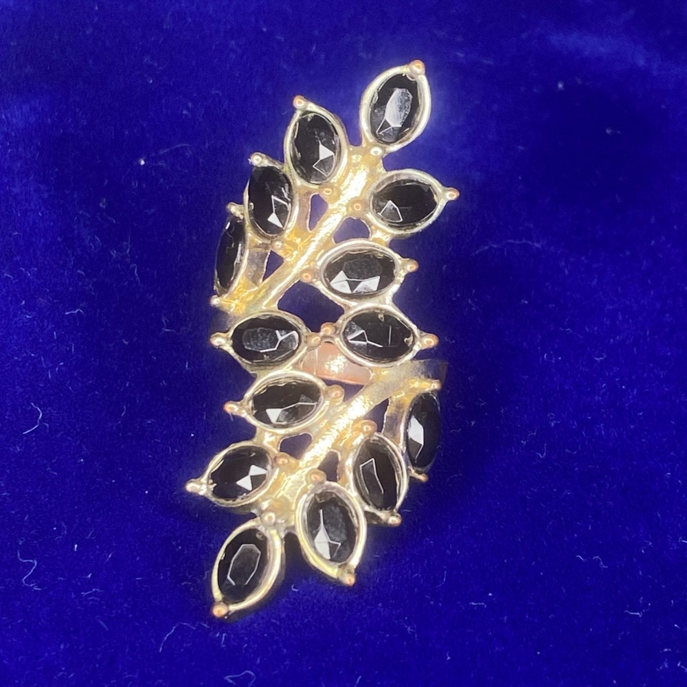 Costume climber gold-toned ring with black crystal-like, fits size 7.5-8